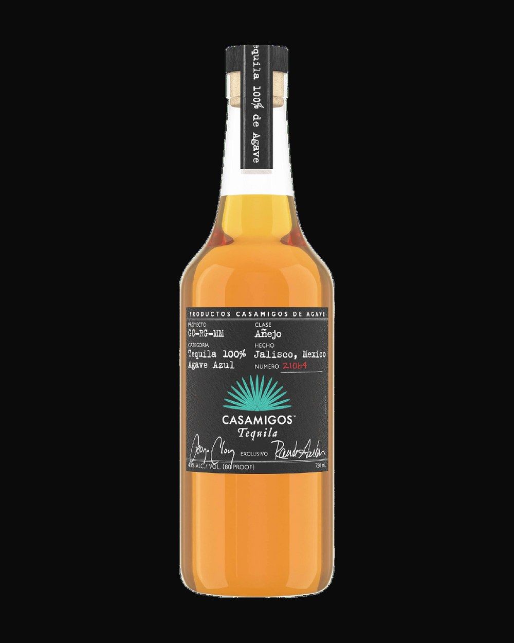 Bottle of Casamigos Añejo, tequila, from Jalisco, Mexico, 750ml — a clear agave spirit bottle on charred stone with lime and salt