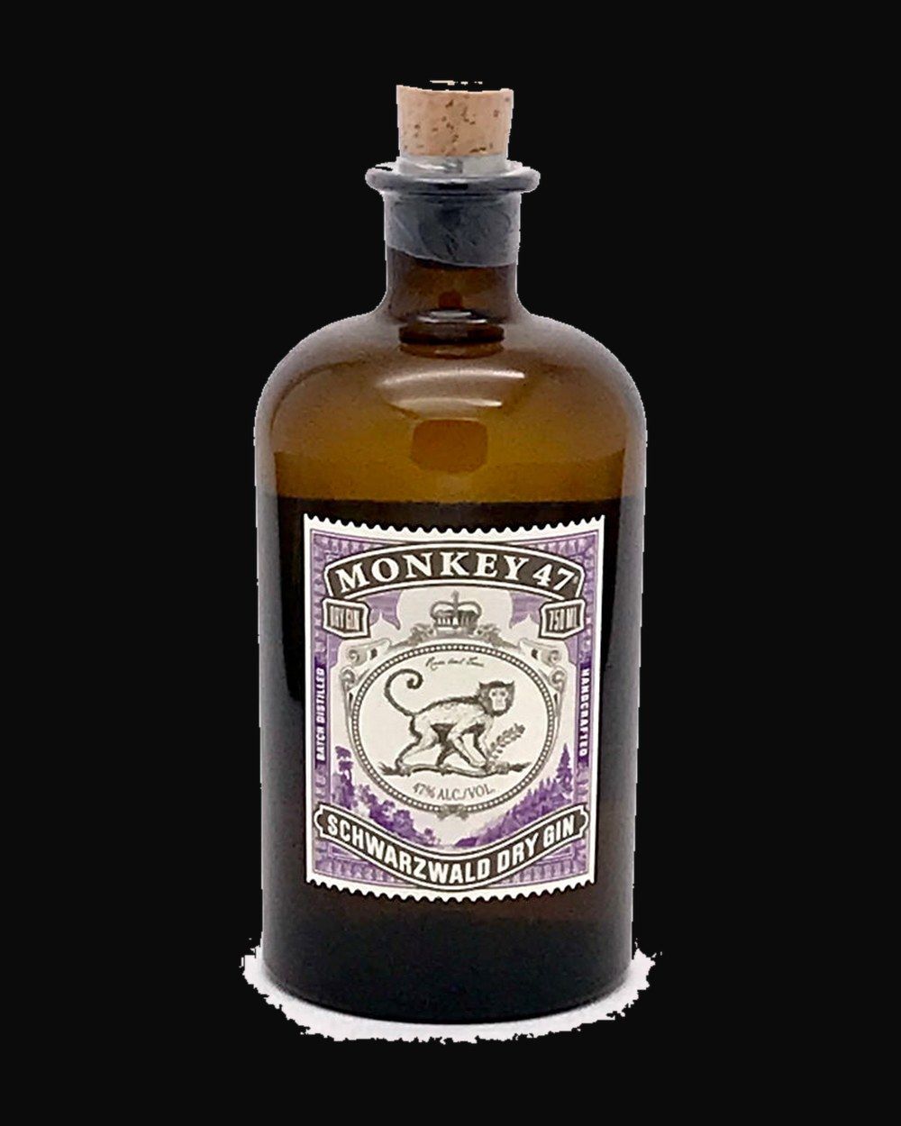 Bottle of Monkey 47 Schwarzwald Dry Gin, gin, from Black Forest, Germany, 500ml — a botanical gin bottle framed by juniper sprigs and dried citrus